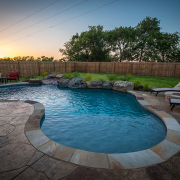 Freeform Pool with Massive Moss Rock Boulder Coping