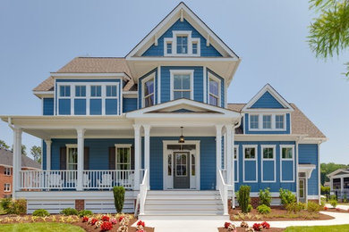 Beach style home design photo in Other
