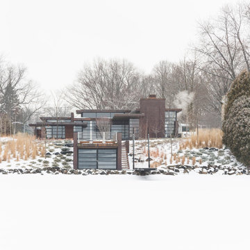 Lac La Belle - Modern Brick Lake Home with Dock and Boathouse
