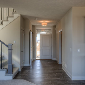 Custom Newport w/ side-load garage and master w/ sitting room
