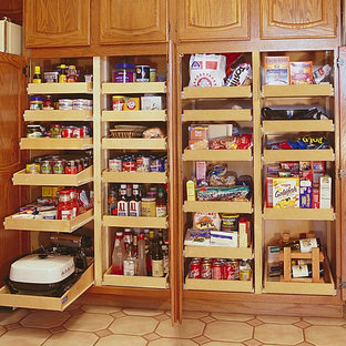 Inspiration for a large traditional kitchen pantry in Phoenix with beaded inset cabinets, light wood cabinets and linoleum floors.