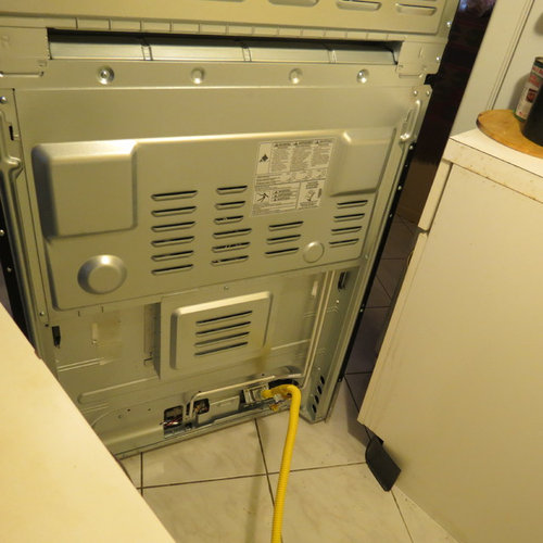 Range not flush with wall. Large gap!