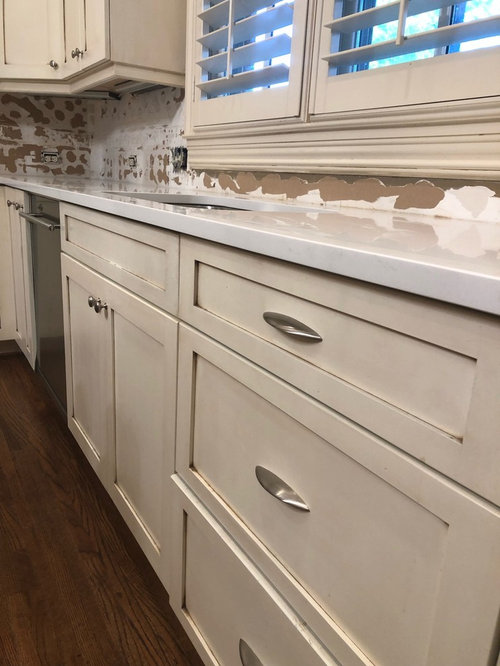 white cabinets with off white countertops