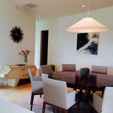 Modern dining room with George Nelson pendant, Seletti pig crate cabinet
