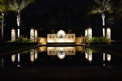 Example of a large tuscan one-story exterior home design in San Diego