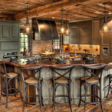 Reclaimed Wood Ceiling Paneling and Timber Box Beams in a Rustic Kitchen