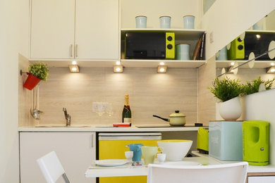 Example of a trendy kitchen design in London