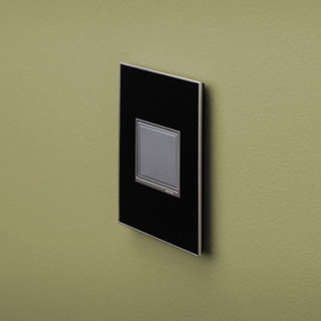 adorne® Pop-Out Outlet with 1-Gang Frame in Magnesium