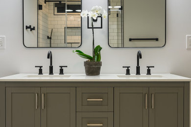 Mid-sized transitional master white tile and ceramic tile ceramic tile, white floor and double-sink bathroom photo in Charleston with shaker cabinets, gray cabinets, a two-piece toilet, an undermount sink, quartz countertops, a hinged shower door, white countertops and a freestanding vanity