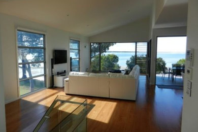 This is an example of a contemporary living room in Newcastle - Maitland.