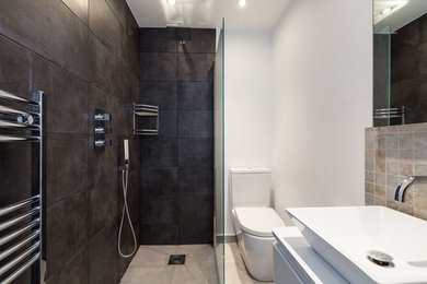 This is an example of a medium sized modern bathroom in London.