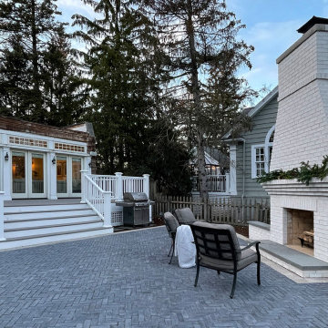 White Brick Fireplace, Paver Patio & Composite Deck Update Shingle Style Home