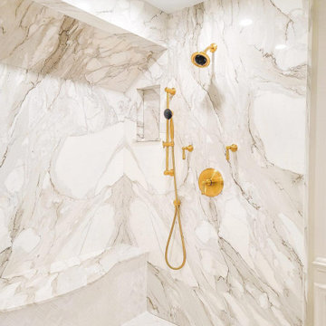 Custom Book-Matched Calacatta Gold Marble Steam Shower