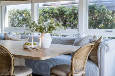 Dining room - coastal dining room idea in Orange County