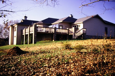 Example of a large classic two-story house exterior design in Charlotte