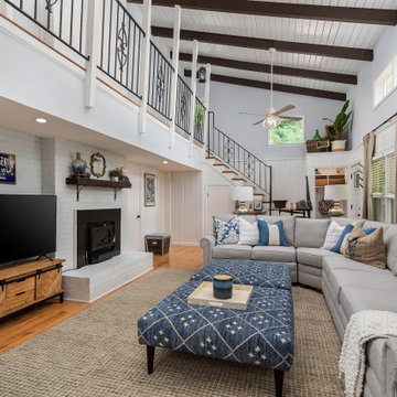White Vaulted Ceiling Family Room