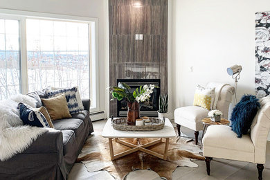 Example of a transitional living room design in Calgary
