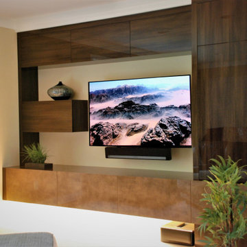 Luxe panel cabinets with no visible hardware and under-cabinet LED lighting