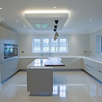 Contemporary high-gloss cashmere & matt taupe kitchen