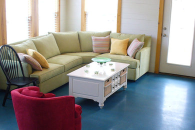 Ejemplo de salón para visitas cerrado bohemio de tamaño medio sin chimenea y televisor con paredes blancas, suelo de cemento y suelo azul