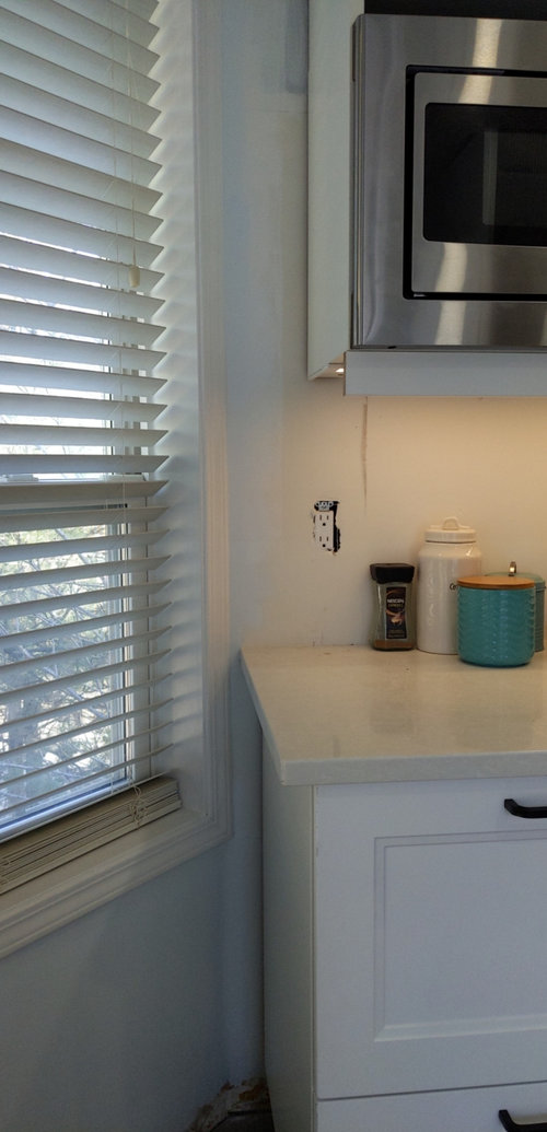 what is the best way to tile this backsplash?