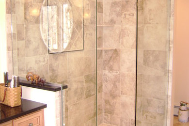Bathroom - large master beige tile and porcelain tile porcelain tile bathroom idea in New York with flat-panel cabinets, medium tone wood cabinets, a two-piece toilet, beige walls, an undermount sink and quartz countertops