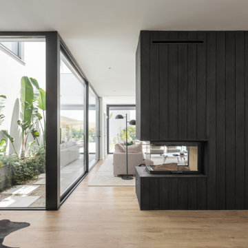 Living Room with Central Fireplace Volume