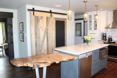 Example of a mid-sized country home design design in Toronto