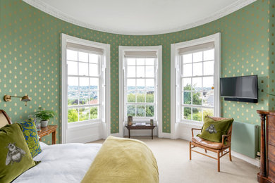 Inspiration for a classic master bedroom in Other with green walls.