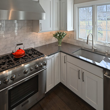 Spring City -- White Kitchen Renovation with Rounded Custom Island