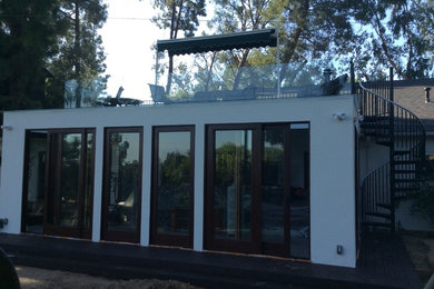 Sunroom with Roof Deck Addition