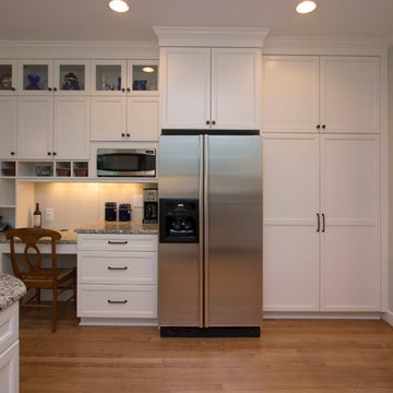 Soft White Kitchen with Blue and Green Accents