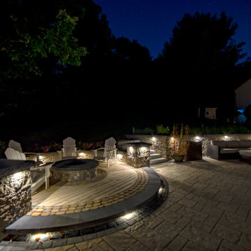 Dual patio with adjoining firepit feature