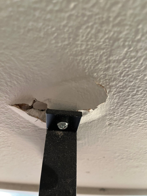 How to fix curtain rod anchor that was ripped out