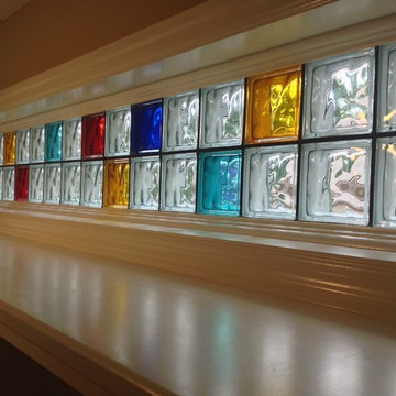 Piet Mondrian inspired black grout and colored glass blocks