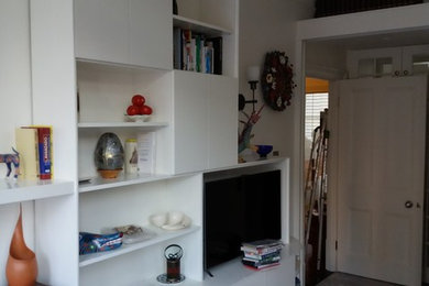 Tv unit and bookshelves unit, sliding door and floating shelf.