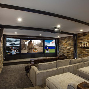 Design ideas for a large classic enclosed home cinema in Salt Lake City with multi-coloured walls, carpet, a projector screen and grey floors.