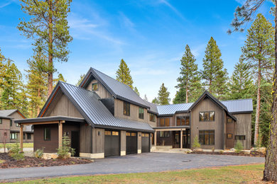Inspiration for a large scandinavian gray two-story mixed siding and board and batten exterior home remodel in Seattle with a metal roof and a black roof