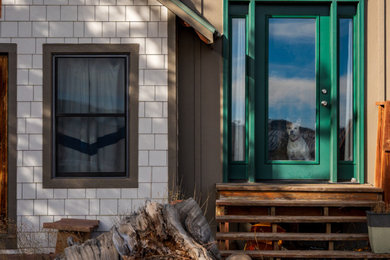 Entryway - mid-century modern entryway idea in Denver
