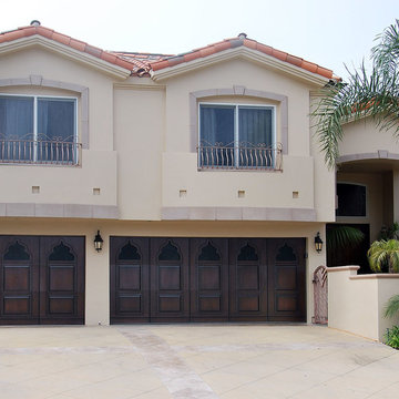 Indian Style Custom Wood Garage Doors Designed for a Corona del Mar CA Residence