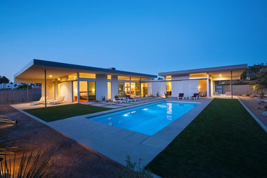 Example of a minimalist exterior home design in Other