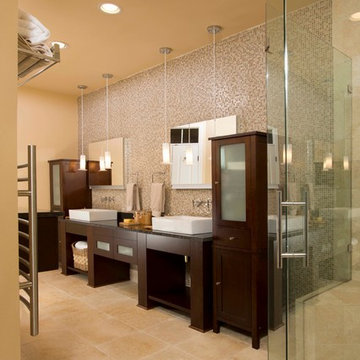 Use of Glass, Light and Fixtures Sets Leesburg Master Bathroom Apart