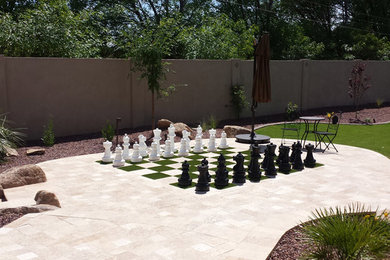 This is an example of a contemporary full sun backyard concrete paver landscaping in Dallas.