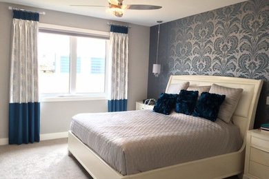 Transitional home design photo in Calgary