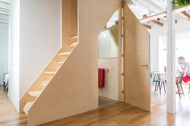 Casas Houzz: Una escalera transforma un ático con vistas a Madrid