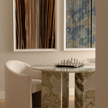 Game Room with Marble Game Table and Wall Art