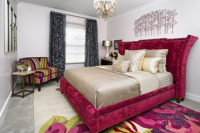 Bedroom - large contemporary guest carpeted bedroom idea in Other with pink walls