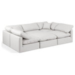 Meridian Furniture - Indulge Upholstered Modular U-Shaped Sectional, Cream, 6-Piece: 3 Armless Chair, 2 Corner Chair, 1 Ottoman, Fiber Stuffed Vegan Leather - Experience ultimate comfort and style with our cream vegan leather Indulge Sectional. The luxurious vegan leather will elevate the aesthetic of any room. This sofa provides ample space for you to relax while its modular build offers the option of unlimited configurations. Whether you're looking to add a stylish element to your living room or a comfortable seating option to your bedroom, this sofa is the perfect choice.