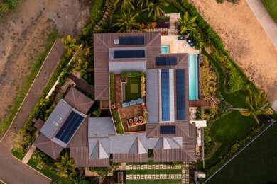 Inspiration for a tropical exterior home remodel in San Diego