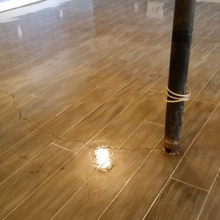 Photo of a medium sized world-inspired walk-out basement in Atlanta with blue walls and concrete flooring.